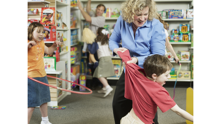 Stressed Parents in Toy Store