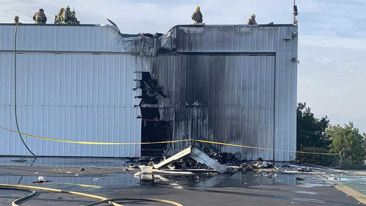Plane crashes into hangar