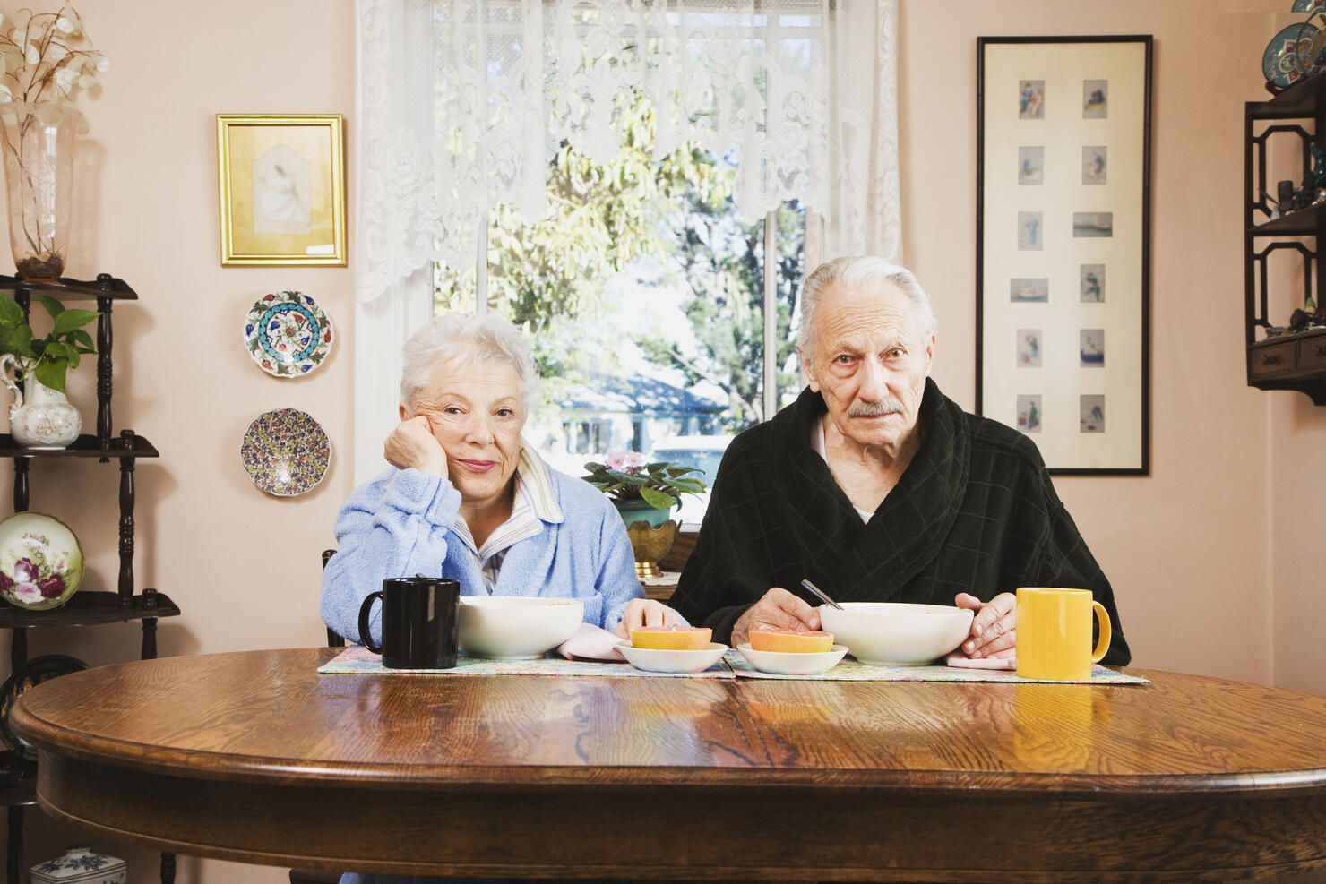 Senior couple at breakfast table