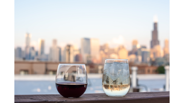 Wine glasses on a rooftop in the city