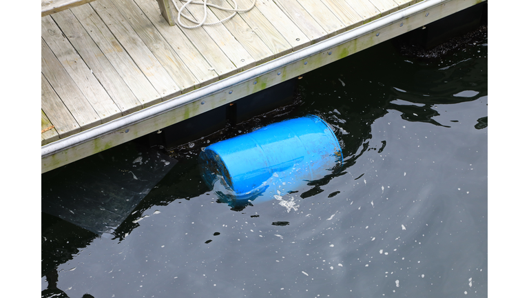 Chemical barrel floating on the water