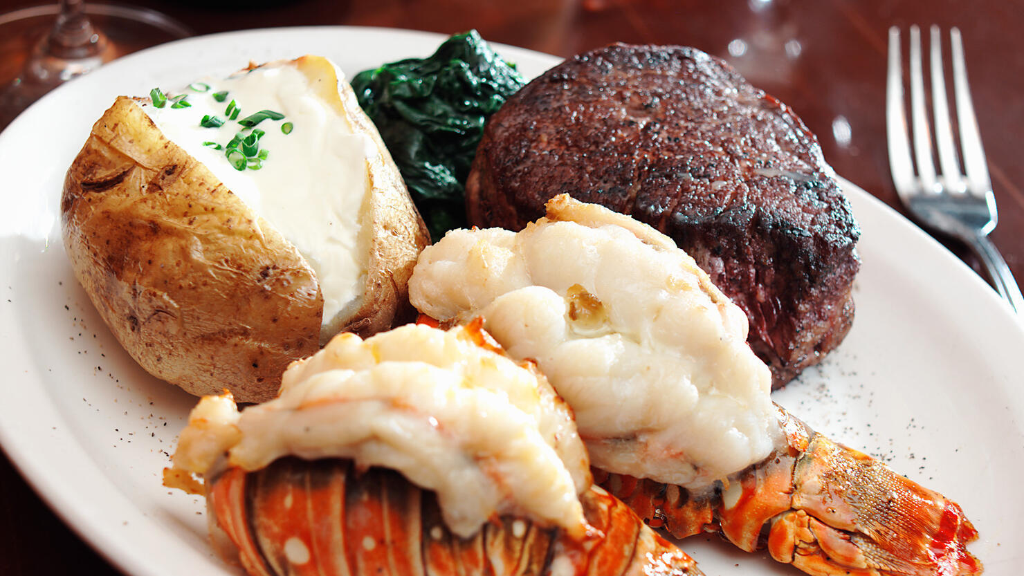 A sumptuous meal of surf and turf with lobster