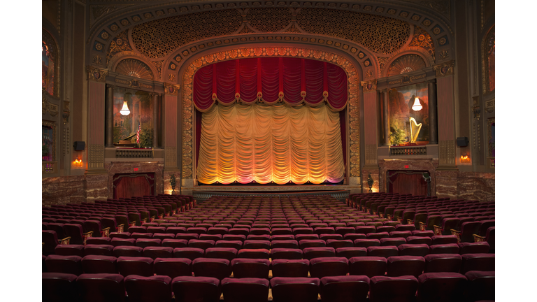 Empty seats in ornate movie theater