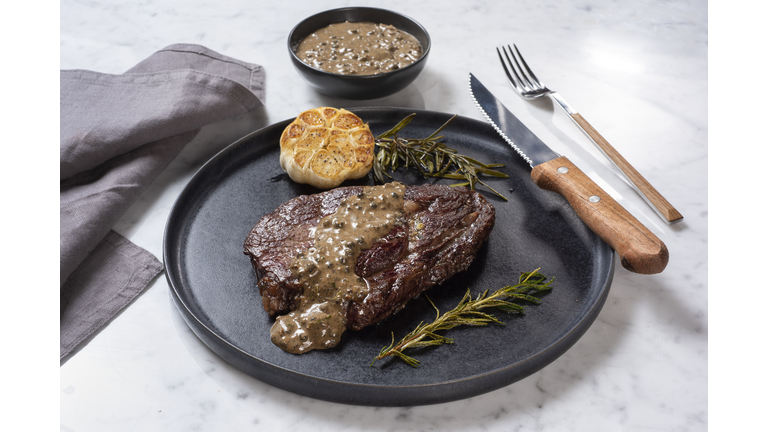 Grilled Beef Steak with Black Pepper Sauce