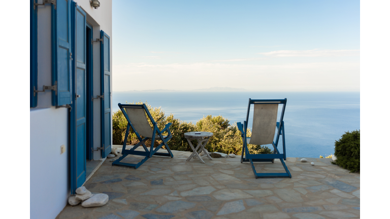 patio with a view, seaside in summertime.
