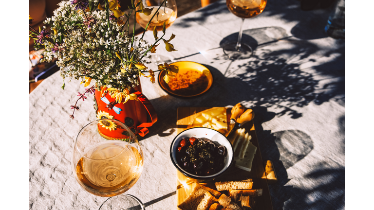 Wine glasses and appetisers on the table