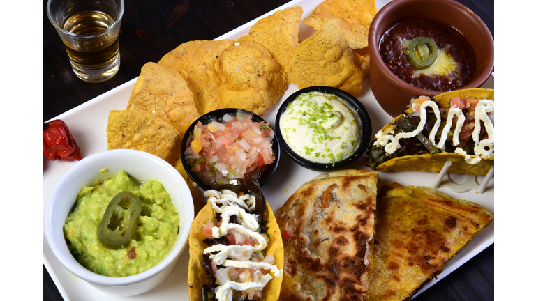 mexican tacos quesadillas and burritos with guacamole chilli salad jalapeno pepper typical tex mex cuisine