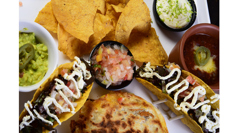 mexican tacos quesadillas and burritos with guacamole chilli salad jalapeno pepper typical tex mex cuisine