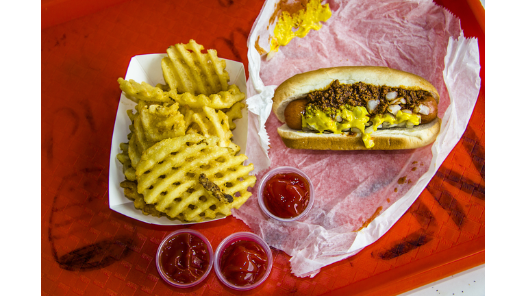 Hot dog and french fries on tray