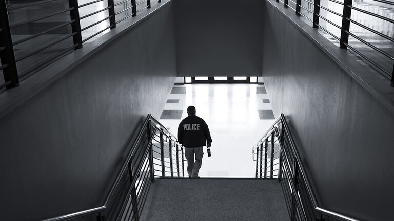 Black and White Photo of a Police Officer