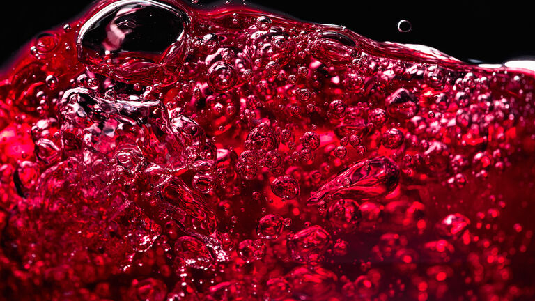 Red wine abstract splashing.