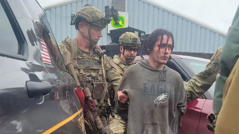 Danelo Cavalcante being taken into custody