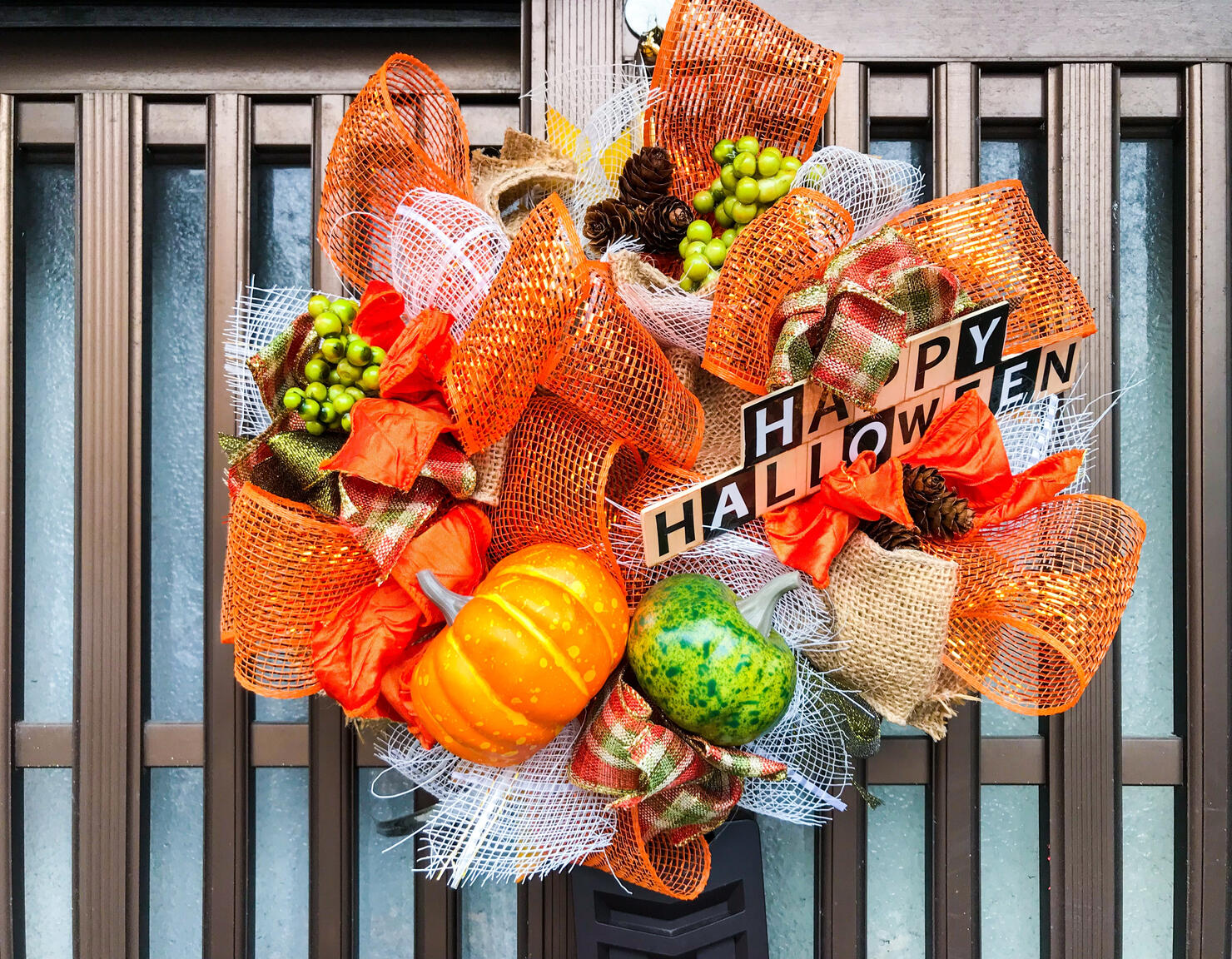 Halloween wreath hanging at the sliding door