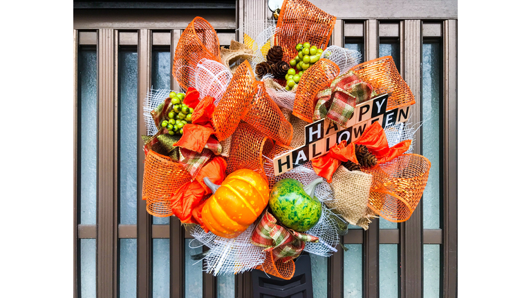 Halloween wreath hanging at the sliding door