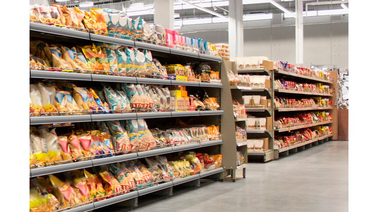 Snacks and Chips on self at supermarket
