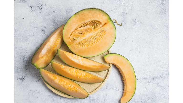 top view cantaloupe cut in half and sliced