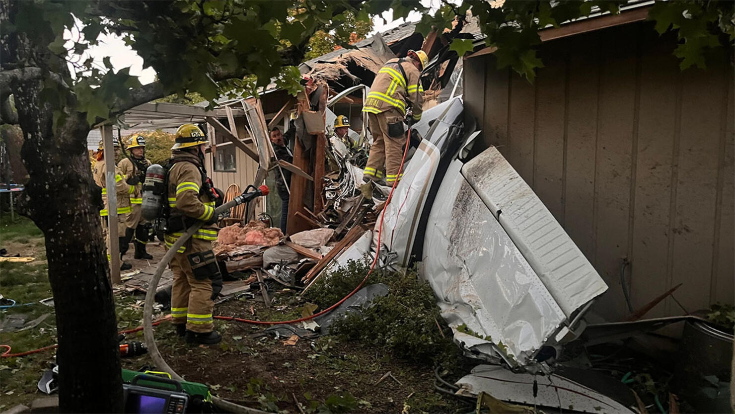 Plane crashes into home