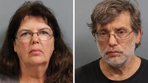 Two Adults Charged After Adopted Children Found Locked In Barn