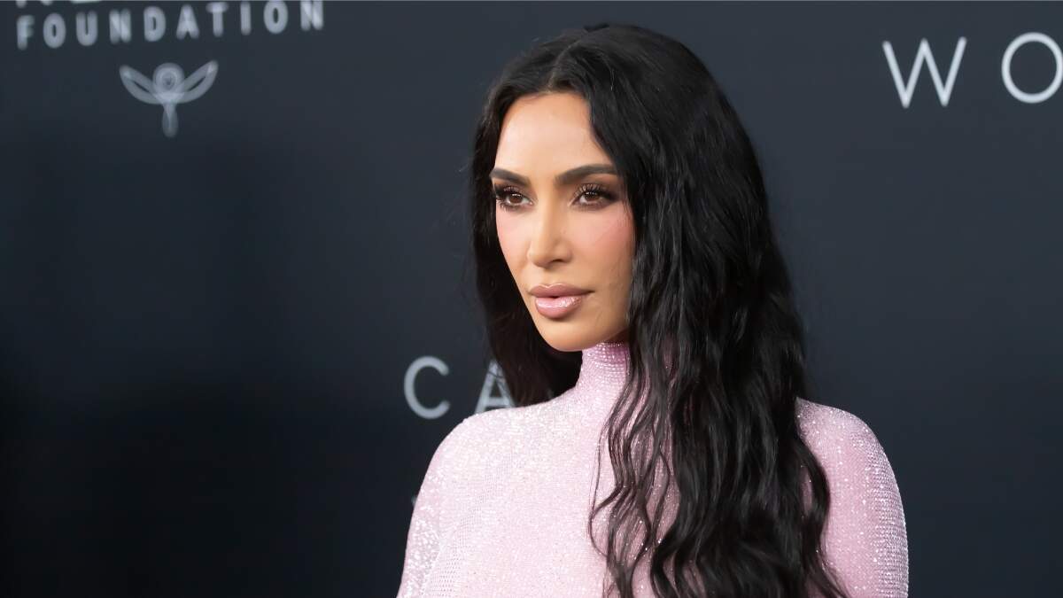 Kim Kardashian Almost Flashes Her B**bs While Trying On A S*xy Neon Green  Lingerie From Her New Collection, Dodges The Wardrobe Mishap Like A Pro