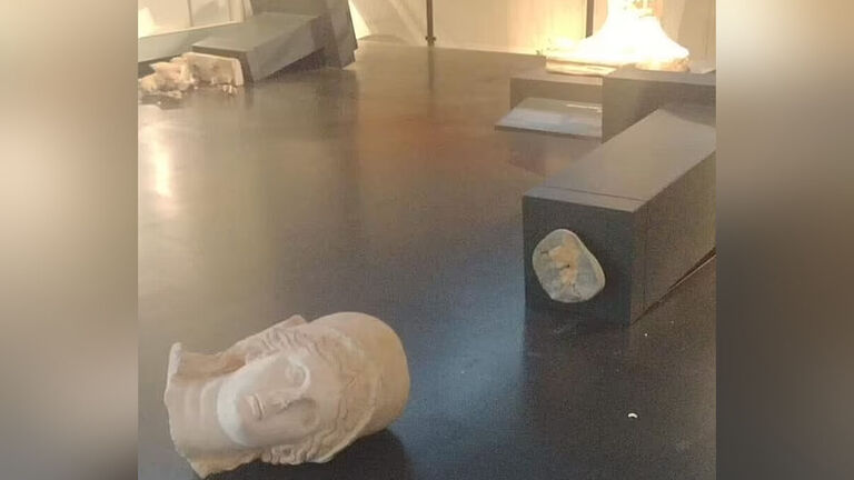 Two Smashed Roman statues