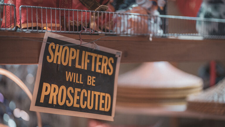 Shoplifters will be prosecuted sign