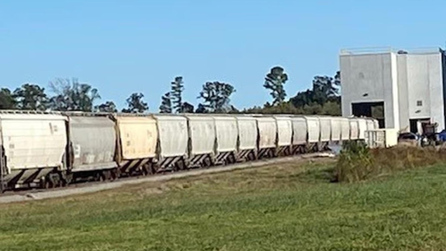 A body was found inside a freight train filled with corn