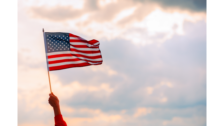 Hand Waving the Flag of the United Stated of America