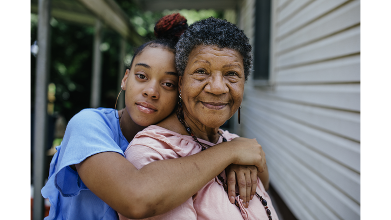 Portrait of black grandmother with teenager granddaughter