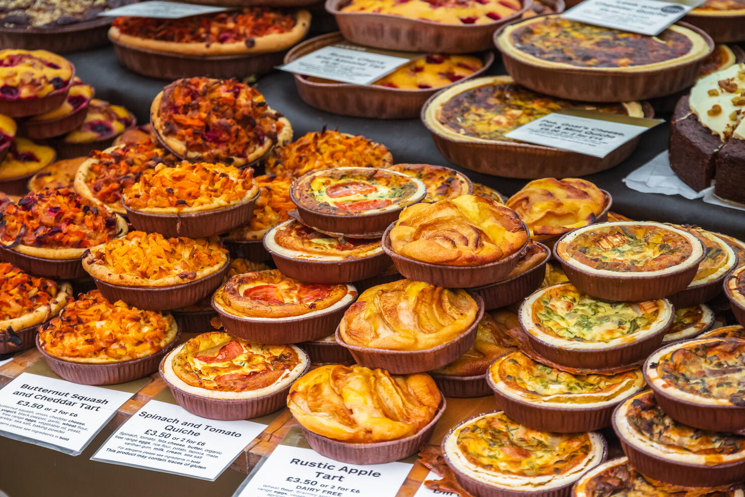 Assortment of tarts on display at Broadway market in Hackney, East London