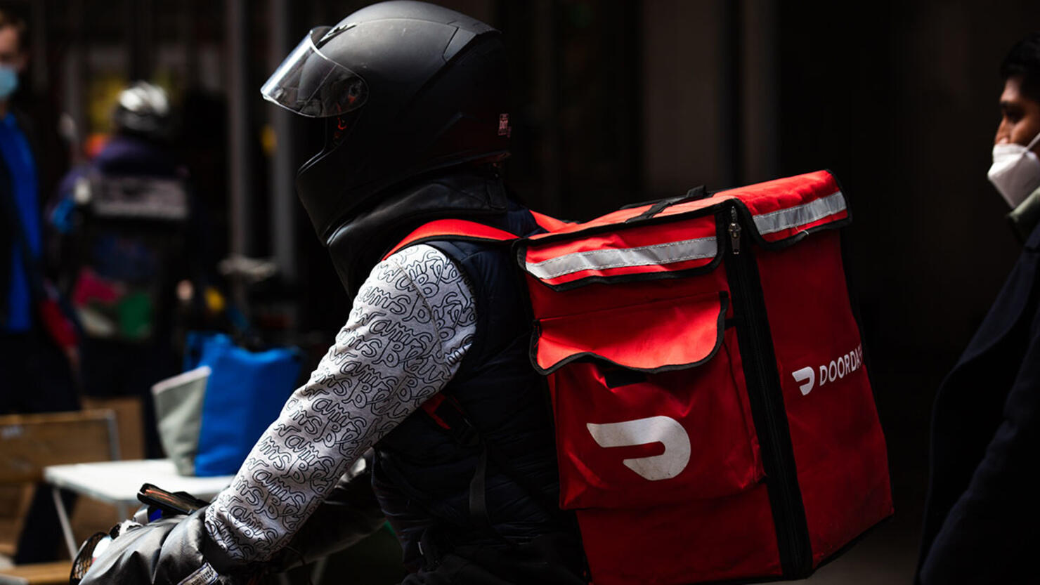 Demonstrators March For Food Delivery Workers Rights