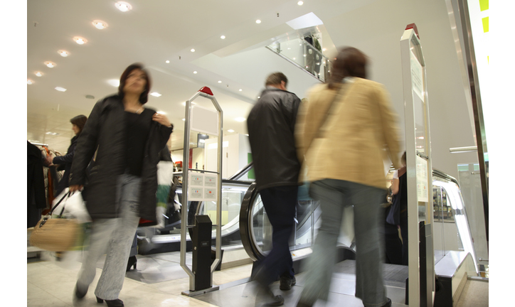 Motion Blurred Customers in Shopping Mall