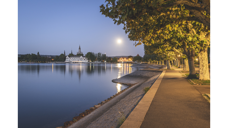 Germany, Baden-Wuerttemberg, Constance, Inselhotel and Constance minster during full moon