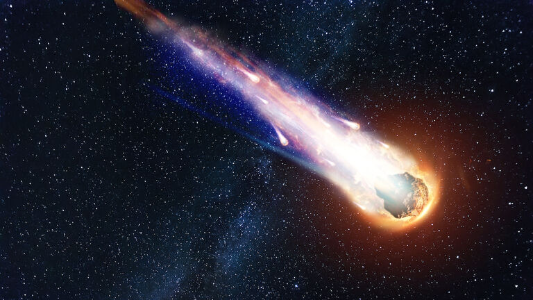 A comet, an asteroid, a meteorite falls to the ground against a starry sky. Attack of the meteorite. Meteor Rain. Kameta tail. End of the world. Astranomy.