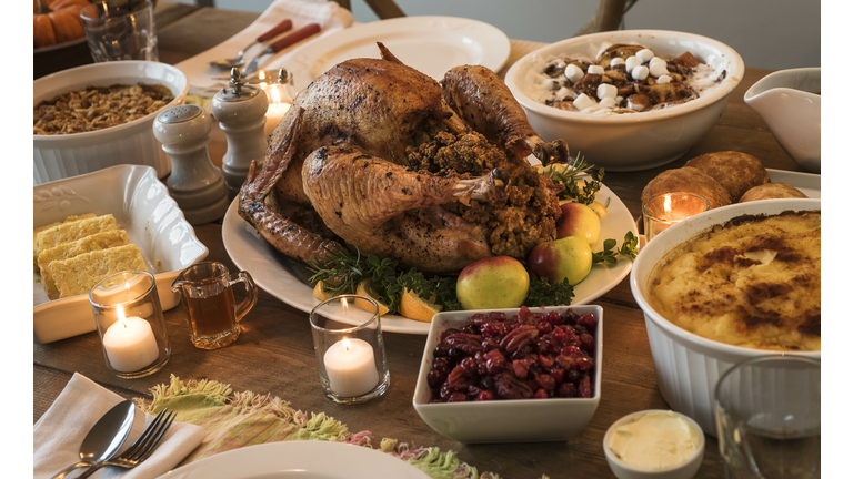 Dining table filled with thanksgiving food