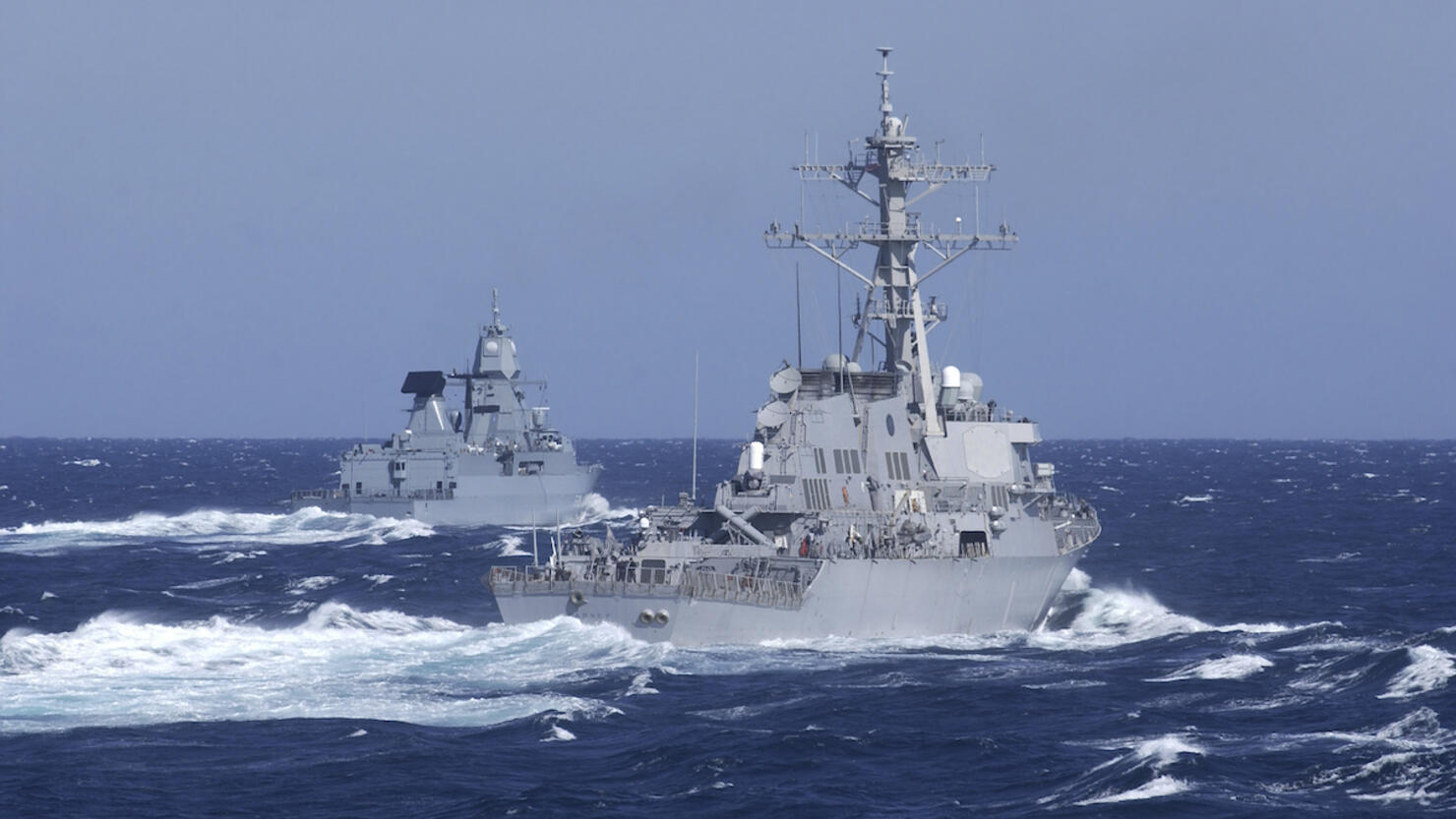 USS Carney practices diversion tactics with the German frigate Sachsen.