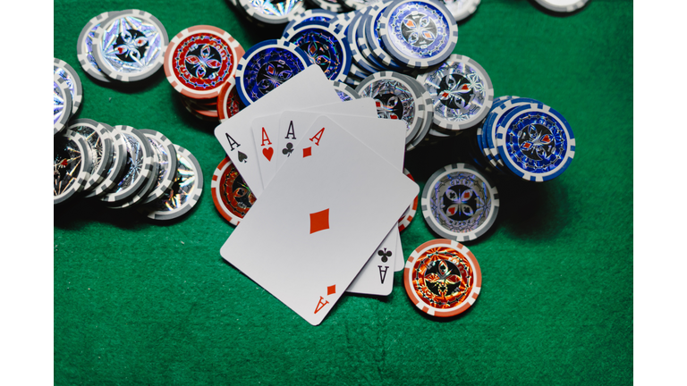 playing poker cards and chips at the poker table