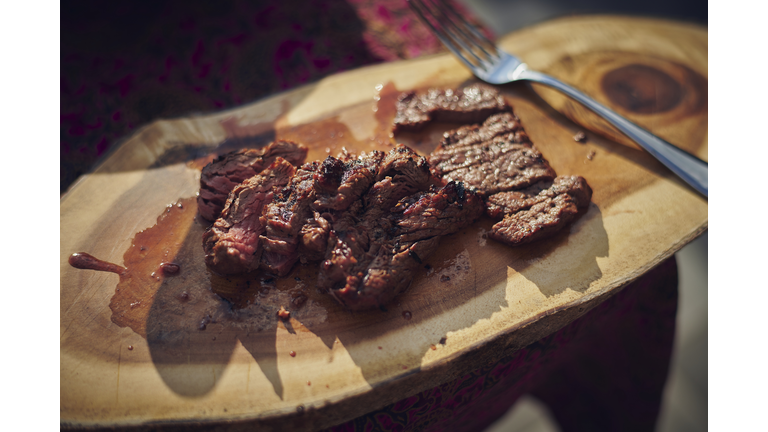 Beef steak cut on chopping board