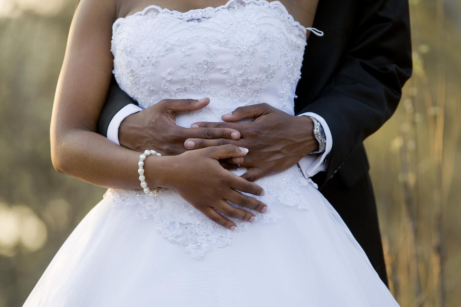 Holding the bride