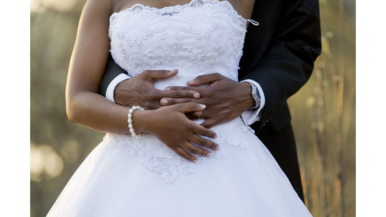 Holding the bride