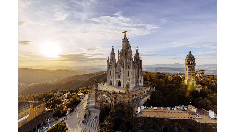 Tibidabo mountain and Sagrat Cor church at sunset, Barcelona, Spain