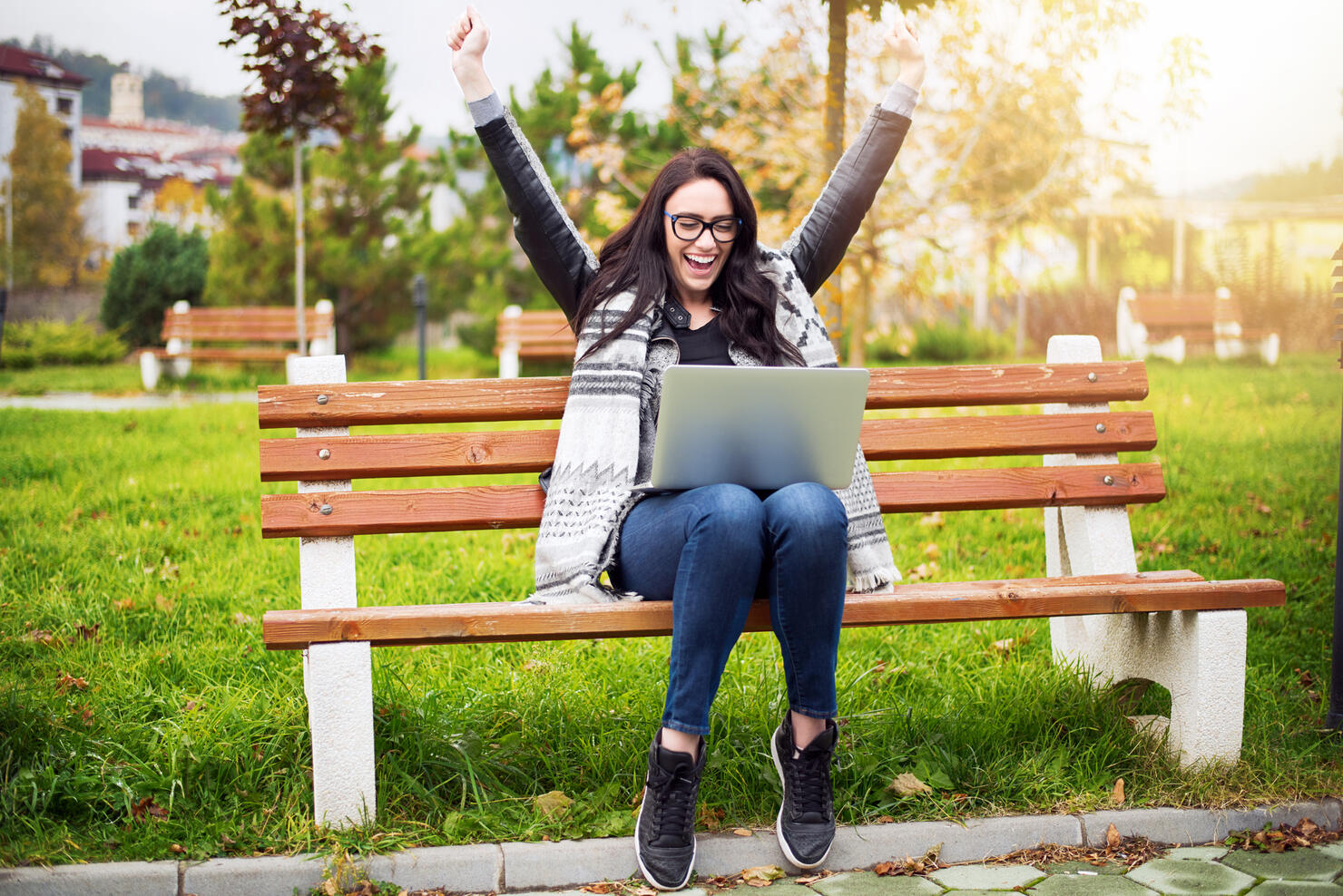 Euphoric winner watching a laptop