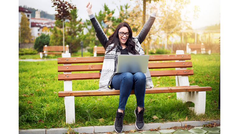 Euphoric winner watching a laptop