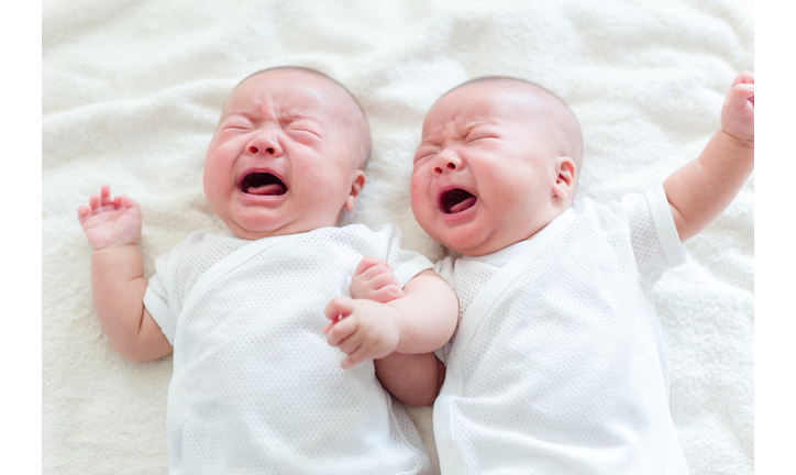 Chinese newborn twins crying