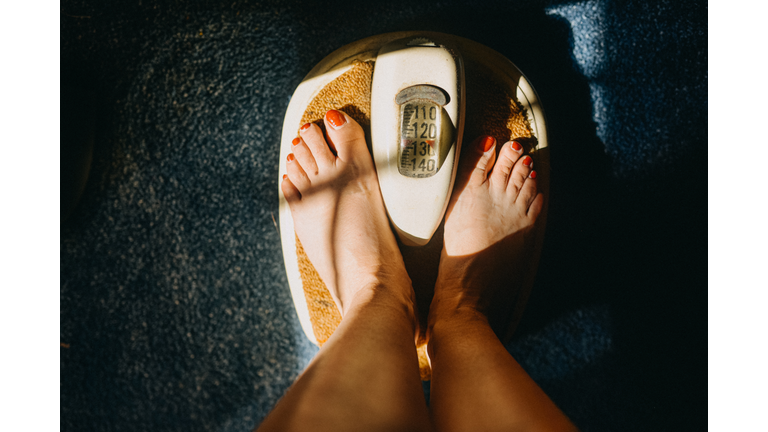 Personal Perspective Of Feet On Scale