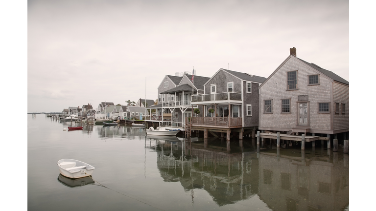 USA, Massachusetts, Nantucket, Old North Wharf, Boats and stilt houses