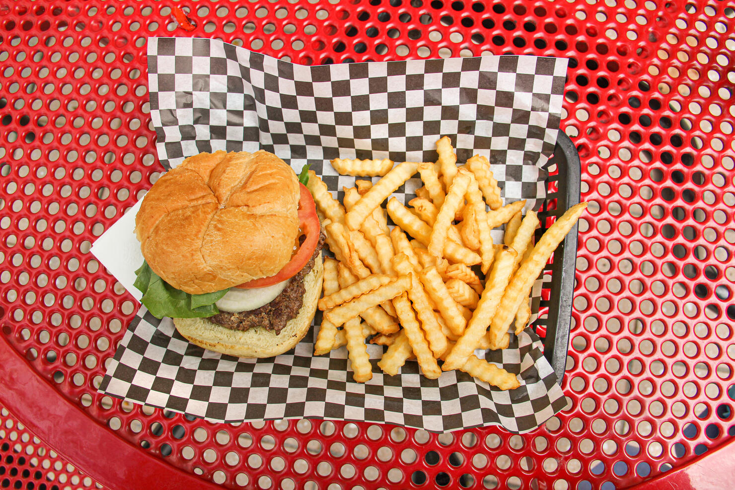 Hamburger and French Fries on Tray Outdoors