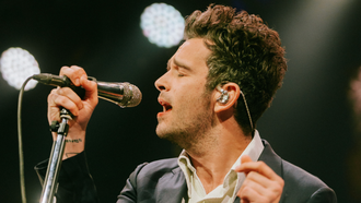 Watch The 1975's Matty Healy Dance With Fans During Hip-Shaking Set