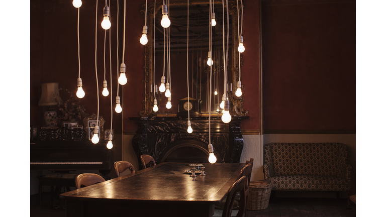 Dining room with hanging lightbulbs
