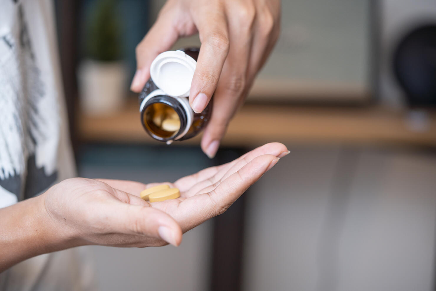 Man taking vitamins and supplements