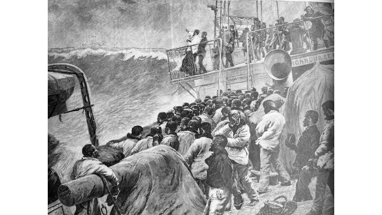 People on deck of a ship in a violent storm